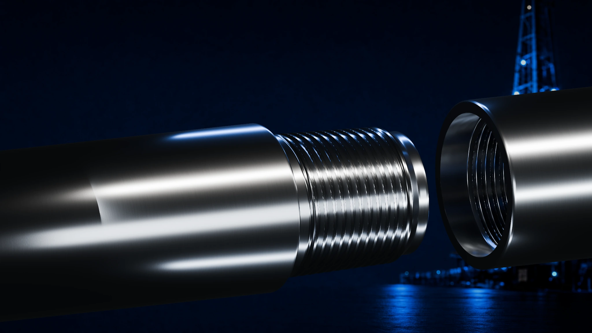 TSC39 pin and box tool joints with machined steel finish against an industrial night background.